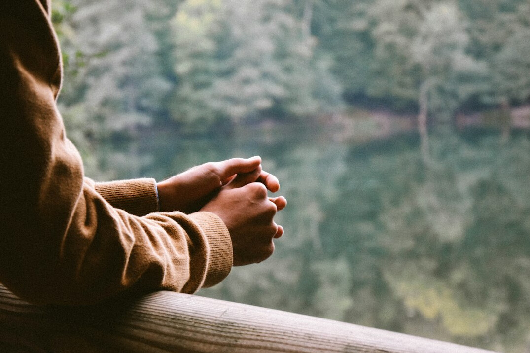 person thinking alone